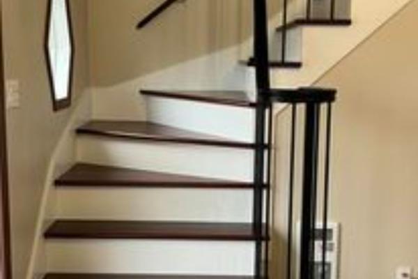 Escalier un coté ouvert